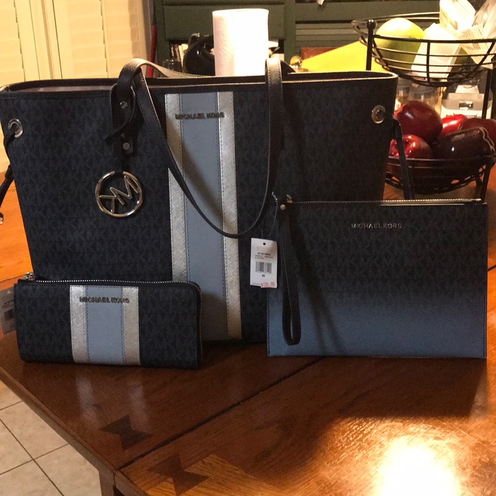 Michael Kors tote wallet and pouch.